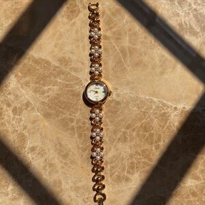 Women's Gold and Pearl Watch